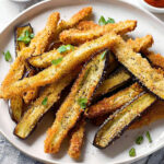 Panko aubergine fries on white plate