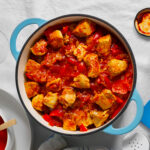Chicken and tomato in a pot