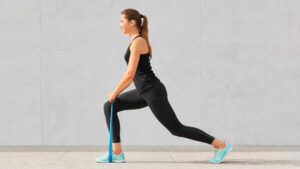 Woman doing a leg workout with resistance band