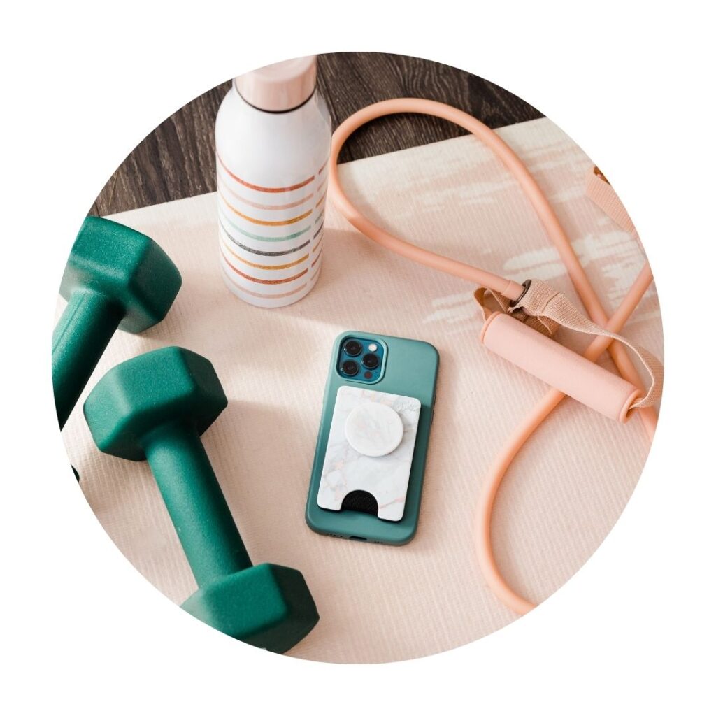 Skipping rope, dumbbells, water bottle and cellphone