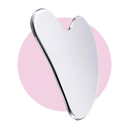 How To Use A Gua Sha Stone To Smooth And Sculpt Skin, According To Dermatologists